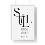 Be Still Before the Lord framed Christian wall art inspired by Psalm 37:7, white frame with black and white scripture typography
