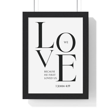 We Love framed Bible verse wall art inspired by 1 John 4:19, black frame with black and white scripture typography