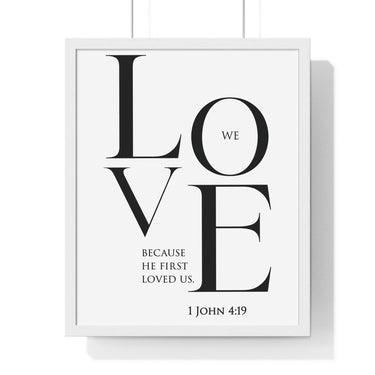 We Love framed Bible verse wall art inspired by 1 John 4:19, white frame with black and white scripture typography