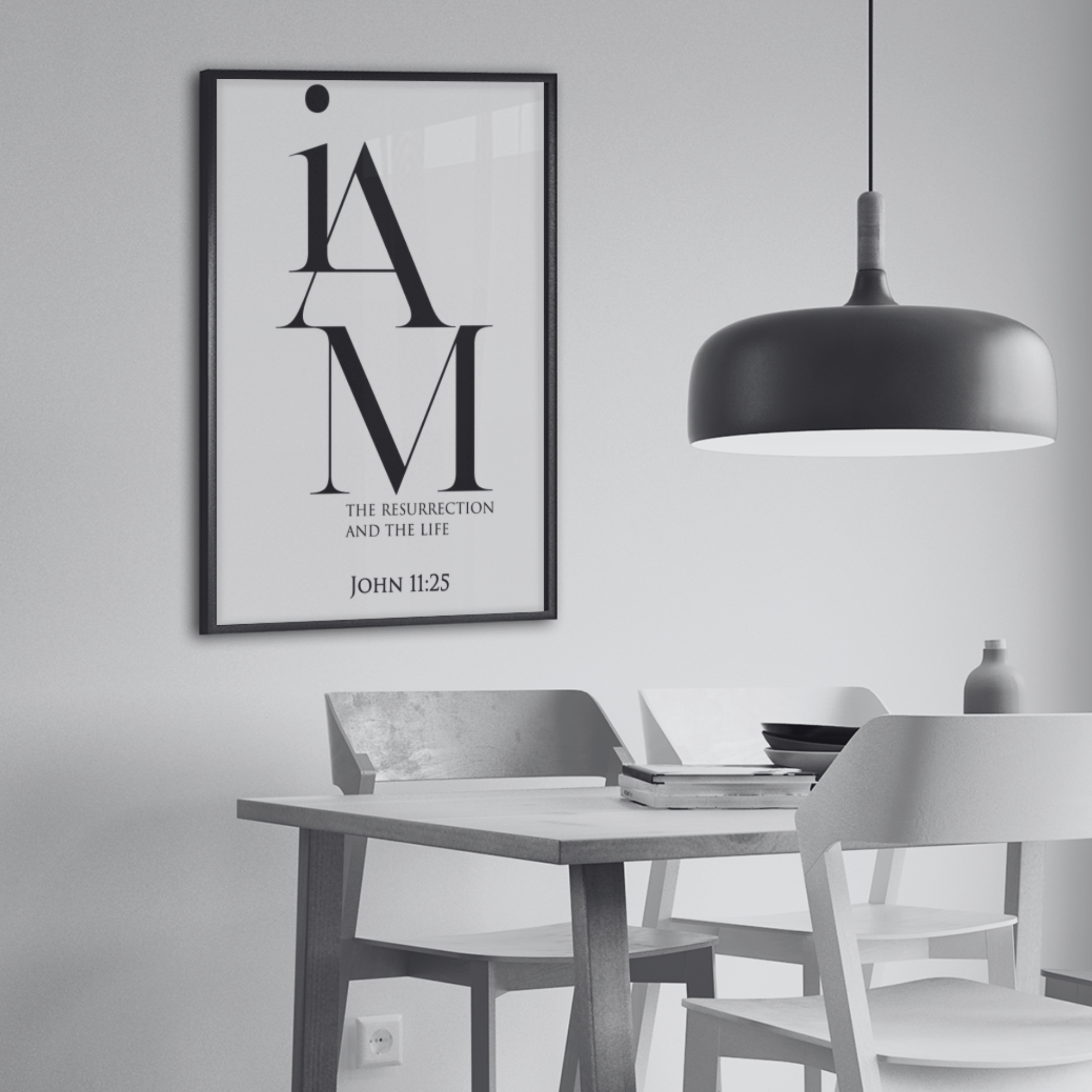 Framed poster with religious quote in a modern dining room.