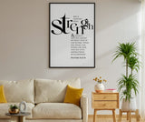 Living room with a framed quote on the wall, beige sofa, and decorative items.