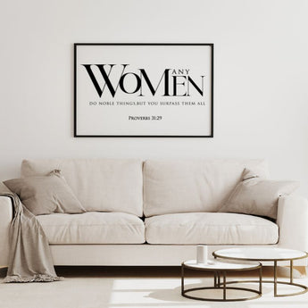 Framed artwork above a beige sofa in a minimalistic living room.