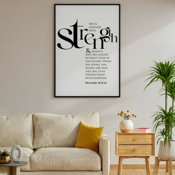 Living room with a framed quote on the wall, beige sofa, and decorative items.