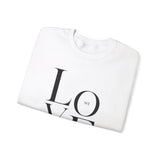 Faith Culture - We Love Because He Loved Us First Christian Unisex Heavy Blend™ Crewneck Sweatshirt