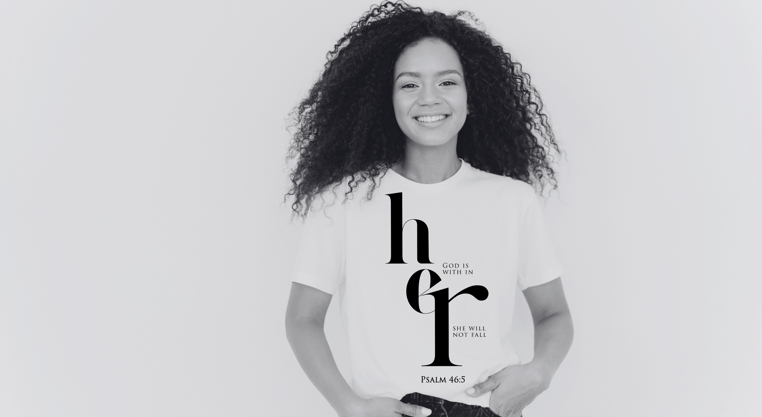 Smiling woman wearing white Christian t-shirt with “God is within her, she will not fall” – Psalm 46:5 inspirational apparel by Faith Culture